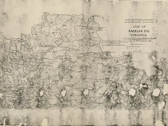 The image shows an old map of the state of Virginia on a piece of paper with text written on it....