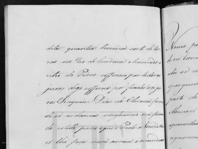The image shows an open book with handwriting on it, which is likely a document from the first page...