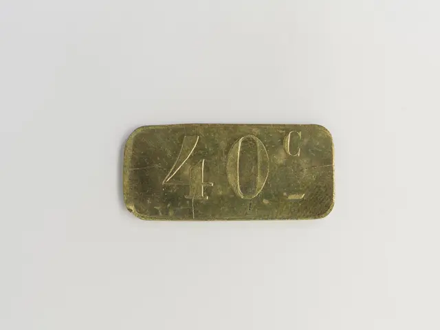 The image shows a gold bar with the number 40 on it against a white background.