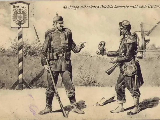 The image shows two German soldiers in uniform standing next to each other in front of a signpost....