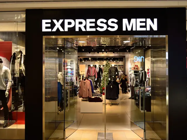 The image shows an express men store in a shopping mall, with mannequins wearing the latest...